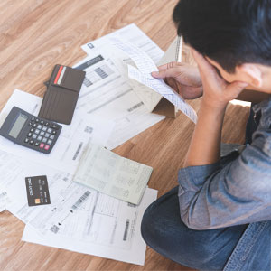 Struggling with finances and debt, a man faces bankruptcy challenges