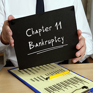 Business concept about Chapter 11 Bankruptcy with phrase on the page.